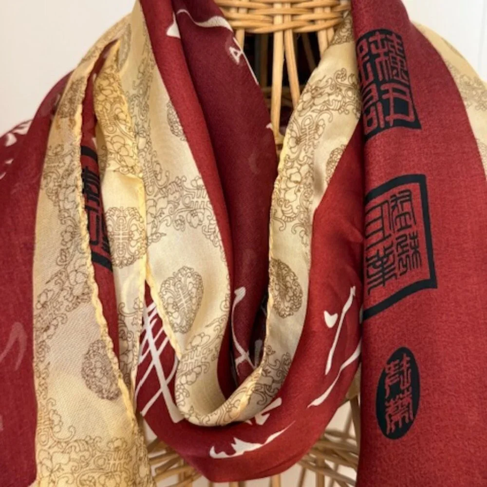 Vintage 100% silk rust and gold oblong scarf.